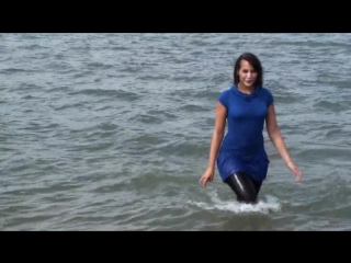 girl bathes in the river [blue dress, black leggings]
